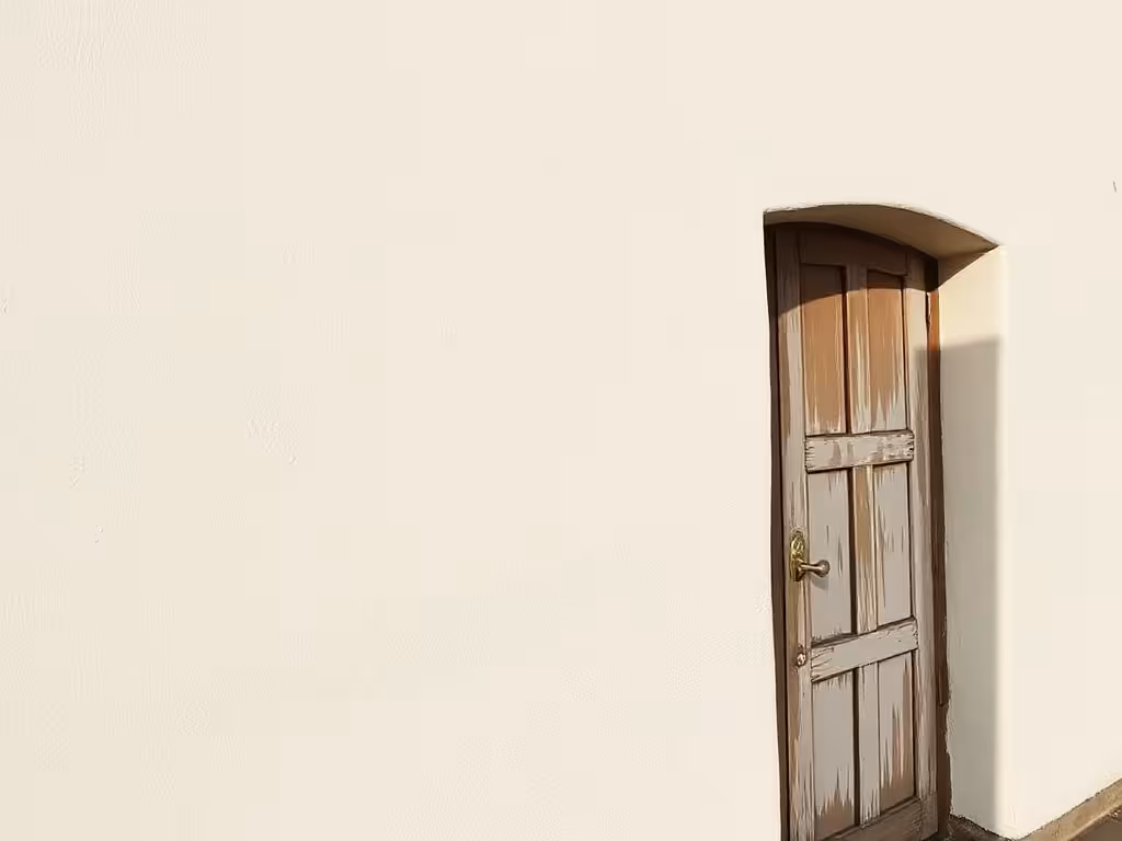 Mur revêtu d'enduit chaux-chanvre fini, montrant texture naturelle et durabilité du matériau.